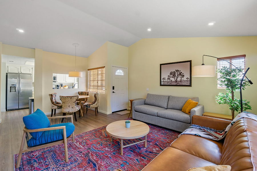 Open floor plan with kitchen open to dining area and living room
