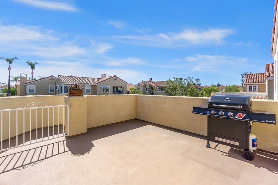 Large deck with propane BBQ just off front door.