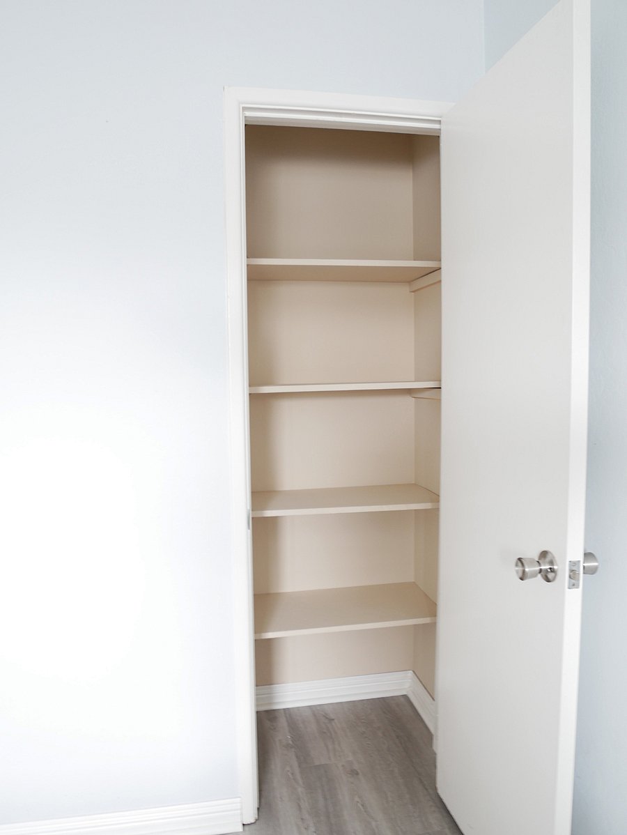 Bedroom with shelf storage