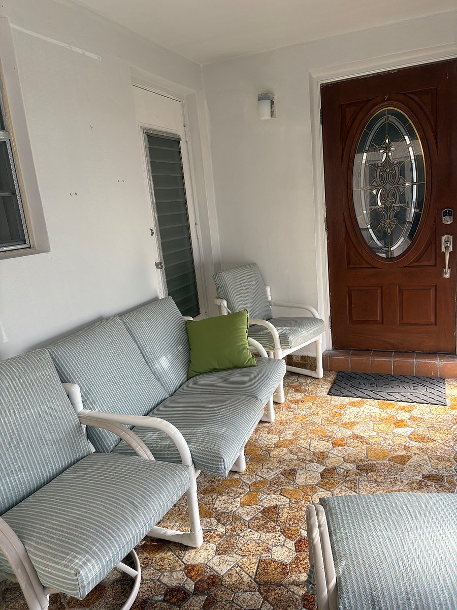 Entrance with attached porch. 