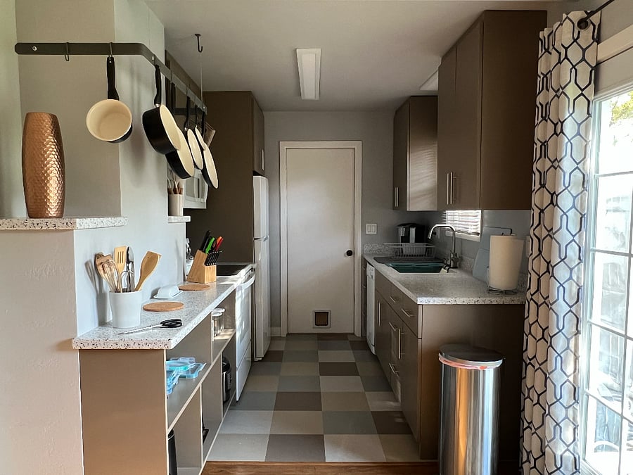 Newly Remodeled Fully-Equipped Kitchen. Lots of Storage Space. Backdoor leading to garage.
