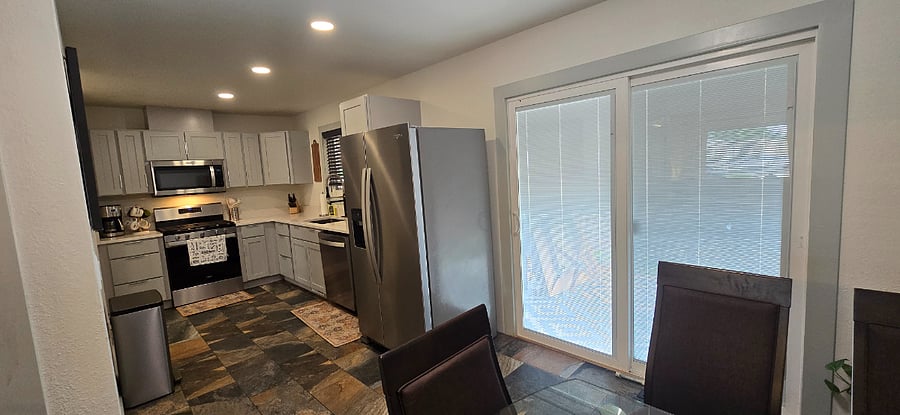 New patio door with internal blinds.