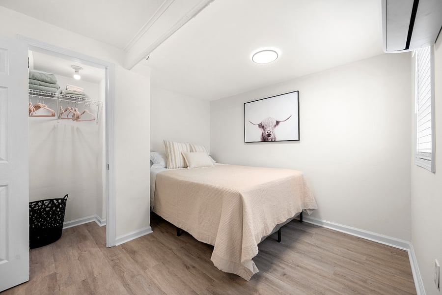 Queen Size Bed, stocked closet with hangers, laundry basked and fresh towels.