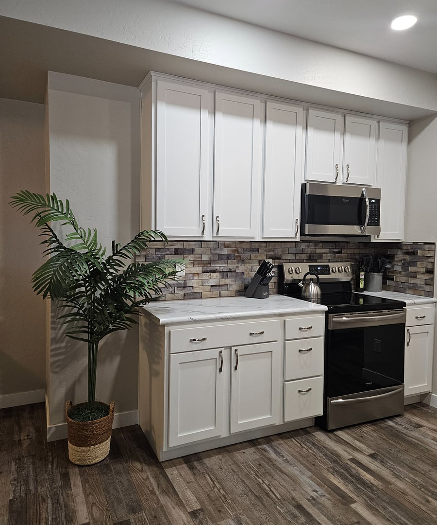 Enjoy cooking in this fully equipped kitchen with stainless steel appliances.
