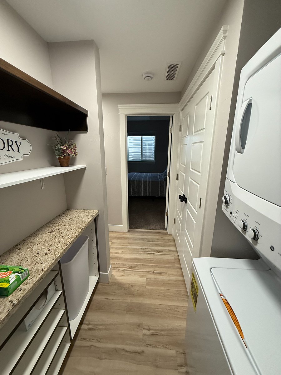 Laundry area with hamper/washer/dryer
