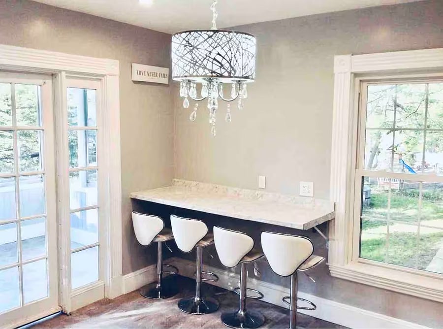 Kitchen Chandelier with kitchen island and barstools