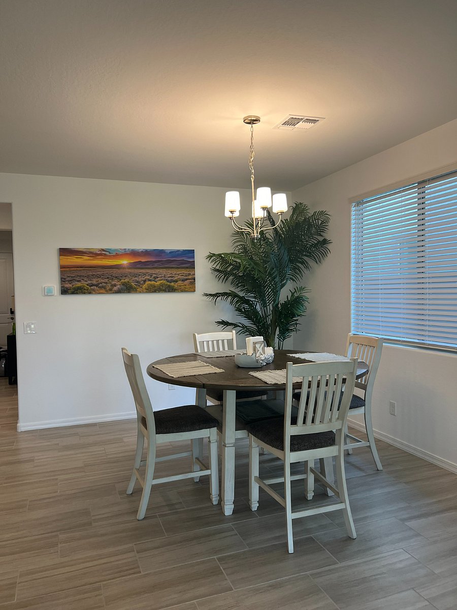 Table has room for 6 plus 3 more at the island