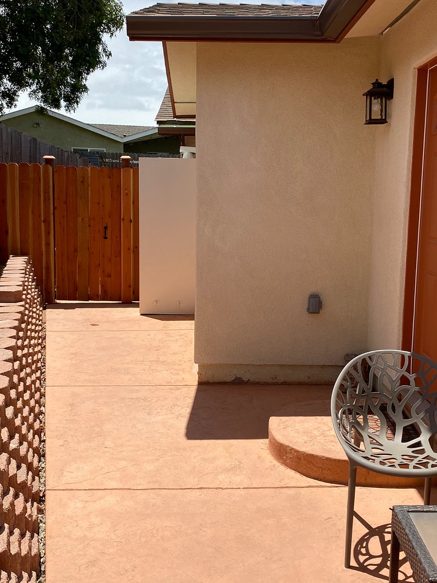 Private front porch area; two chairs and a small table.