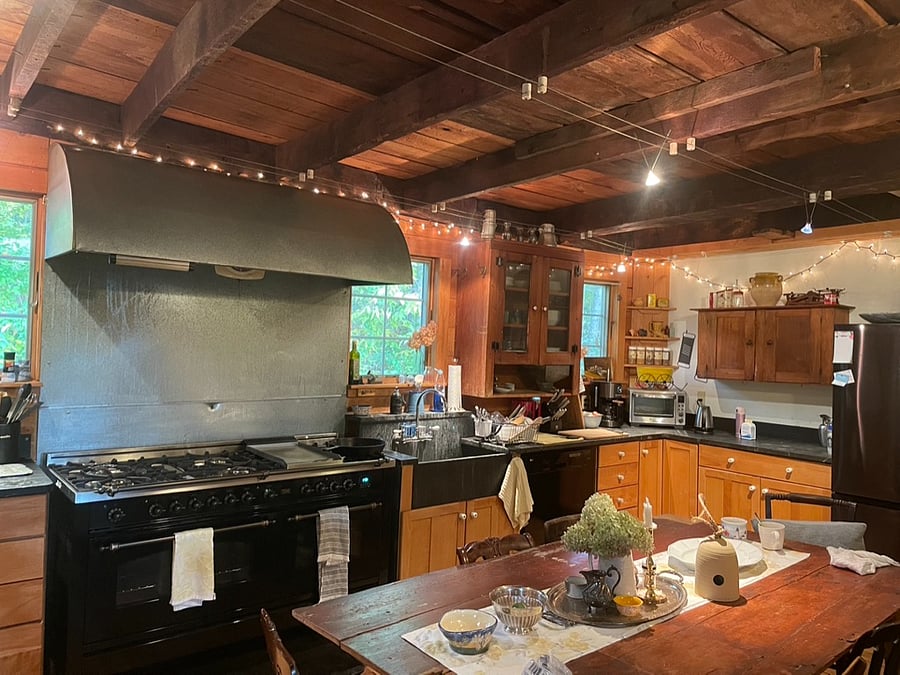Kitchen includes an 8-burner stove (with a griddle!) and a dishwasher