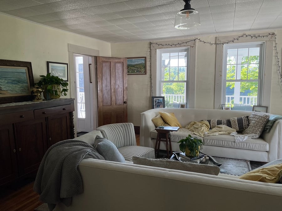 Sunny living room with views of the river