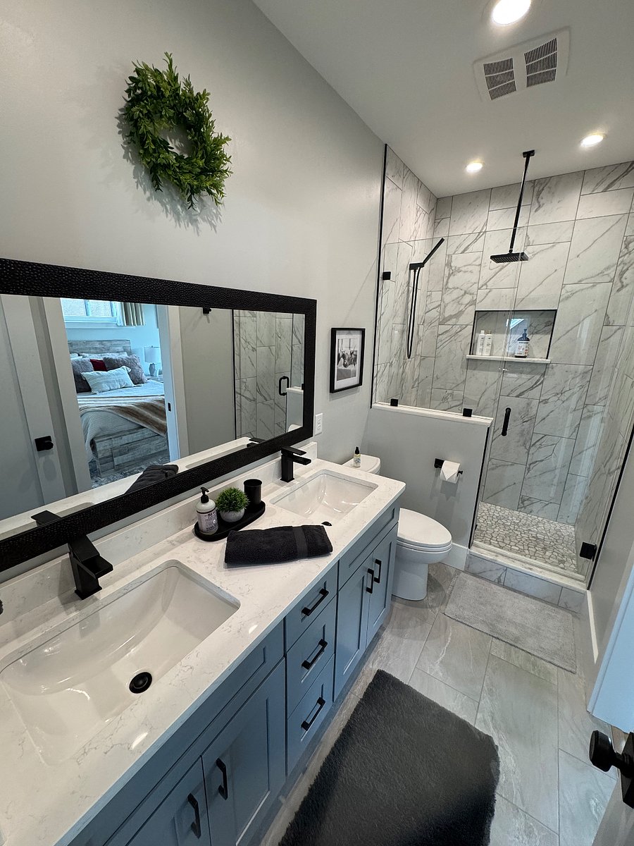 Double sink vanity with rain shower 