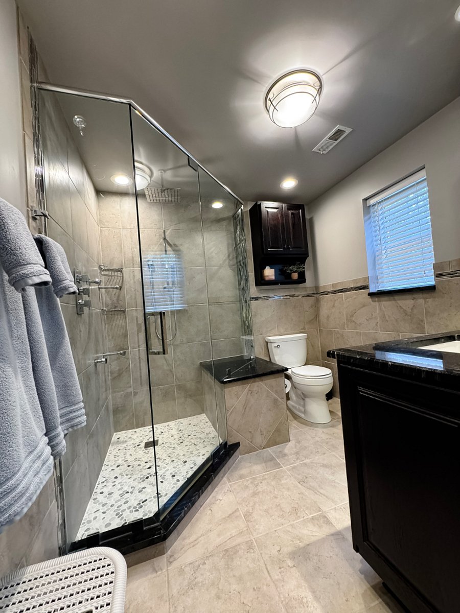 Gorgeous tile and granite custom shower, and a heated floor that you won't forget.