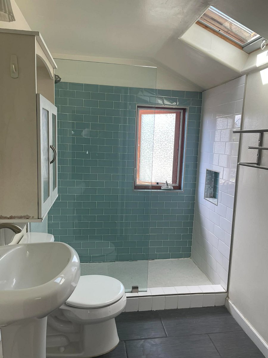 Fresh, airy private bathroom with shower