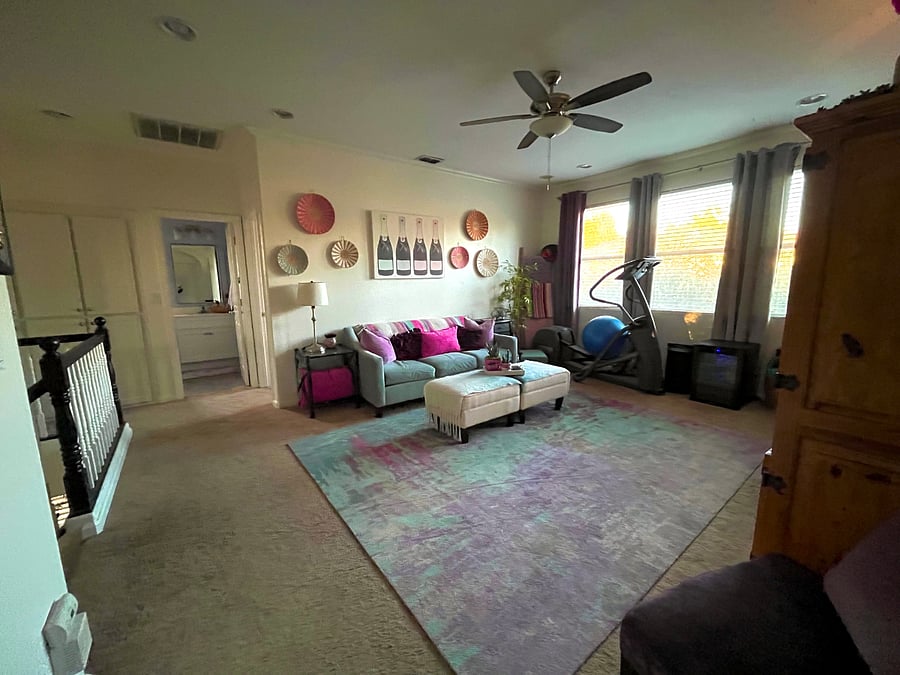 Upstairs living area/workout room (mini fridge also).