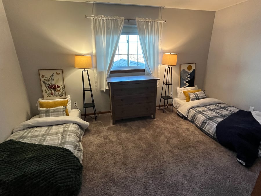 There ARE wooden beds with drawers here now. This picture was taken before our first tenant moved in last year and the beds were on back order. I will update when the tenant moves out but this 2nd bedroom has two twin beds, a dresser and full closet.