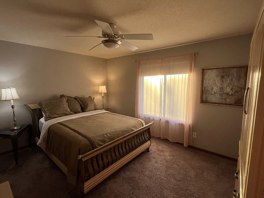 A cozy master bedroom with custom linens on a quality mattress with blackout curtains, noise machine and fan available will be a welcome place to rest. There is plenty of storage with a large armoire, closet and dresser as well.