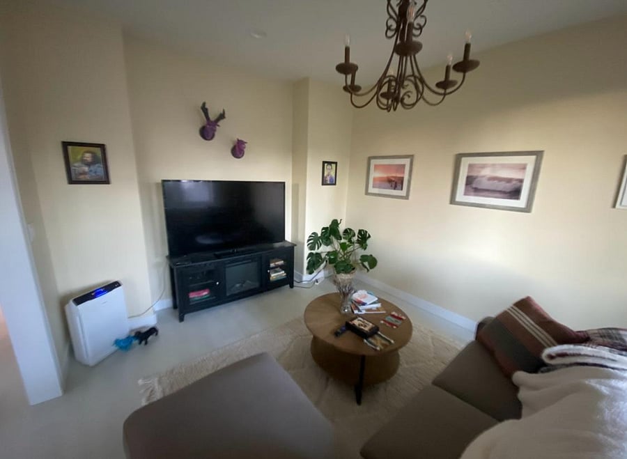 TV room with 65" HDTV and surround sound