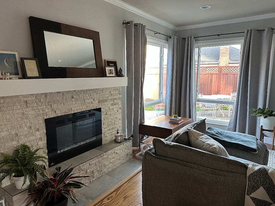 An electric fireplace to add ambiance or warmth