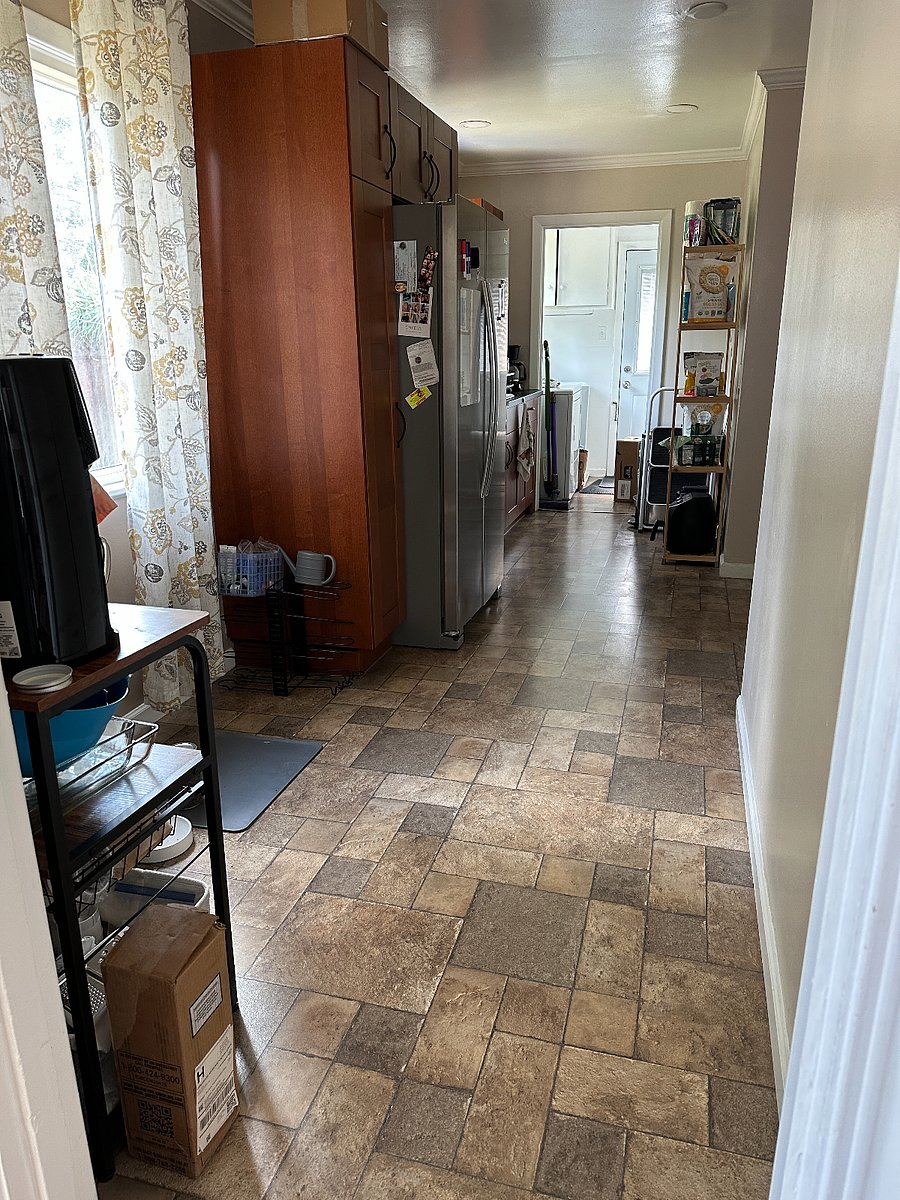 Spacious kitchen equipped with pantry space and basic cooking tools for all your culinary needs