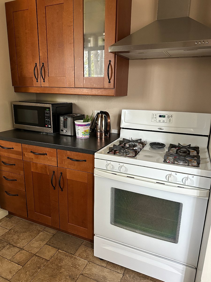 Microwave, toaster, kettle, stove