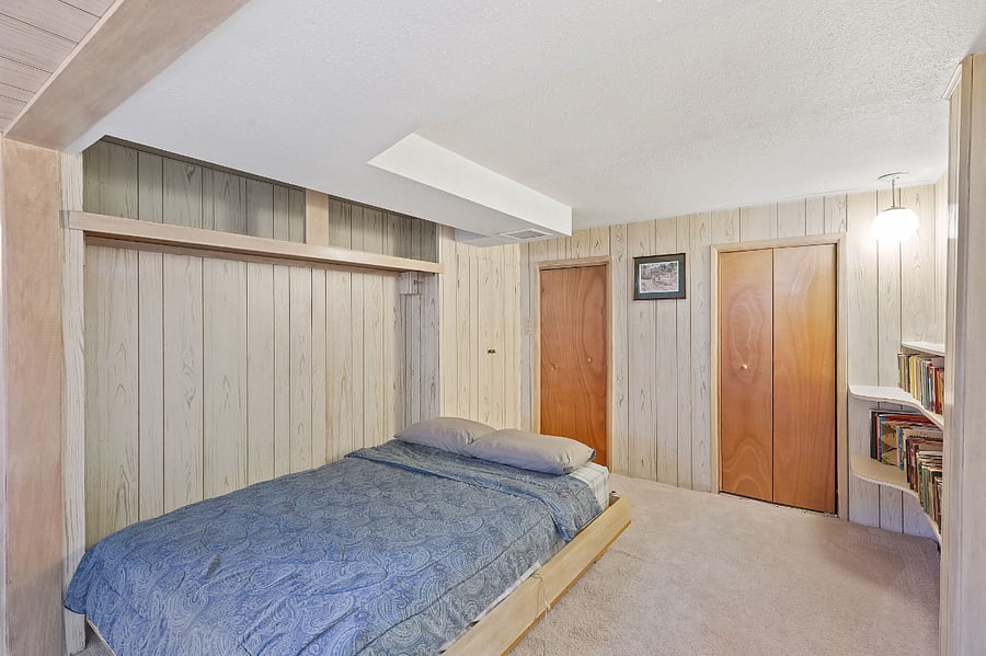 Double Murply bed that pops out of the wall in the basement.