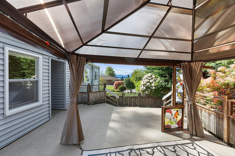 View from inside the pergola, facing west looking at the Olympic Mountains and Puget Sound
