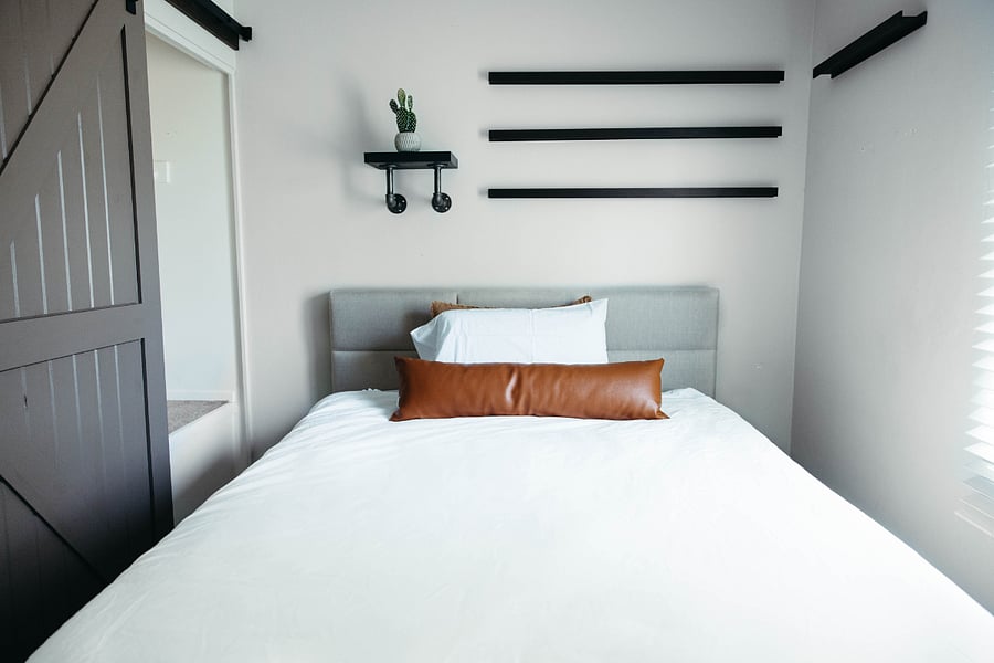 Queen bed in guest bedroom 1