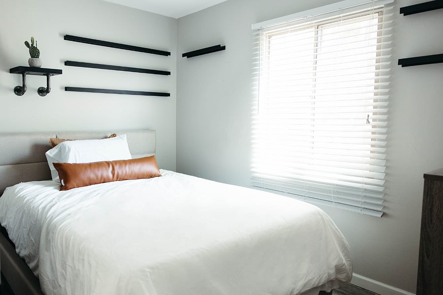 Queen bed in guest bedroom 1
