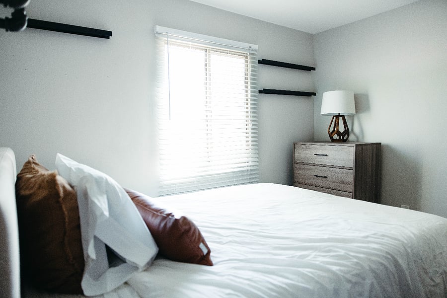Queen bed in guest bedroom 1