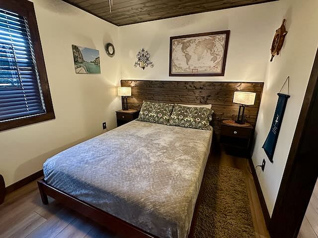 Bedroom with queen-size bed.