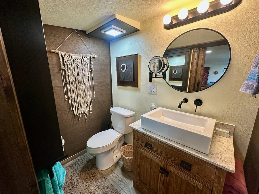 Full size bathroom with standup rainshower.