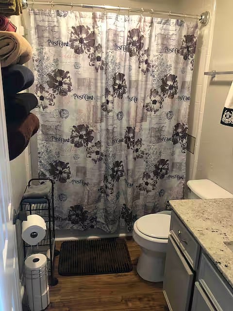full size tub with shower