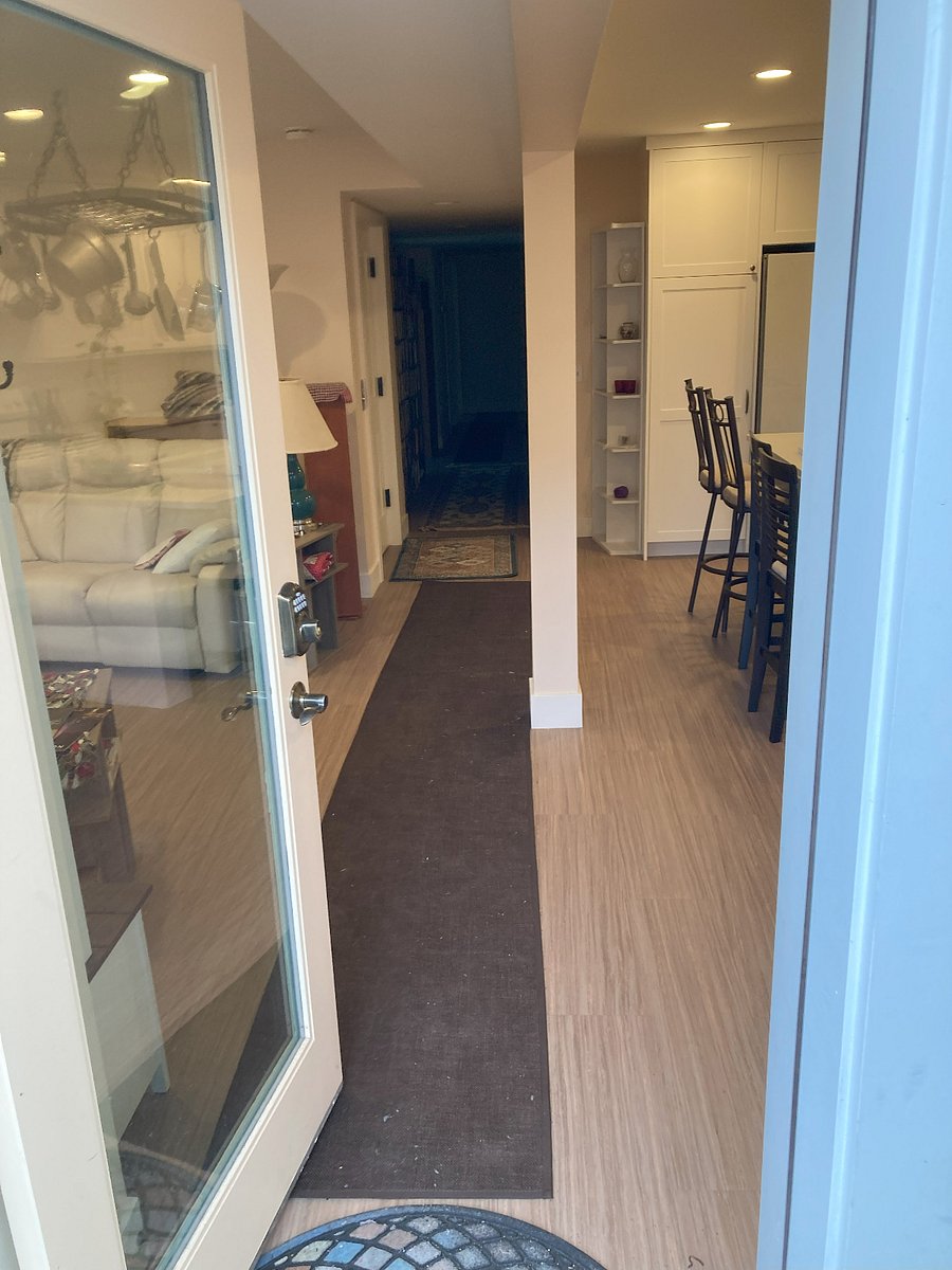 Go through front door into apartment.