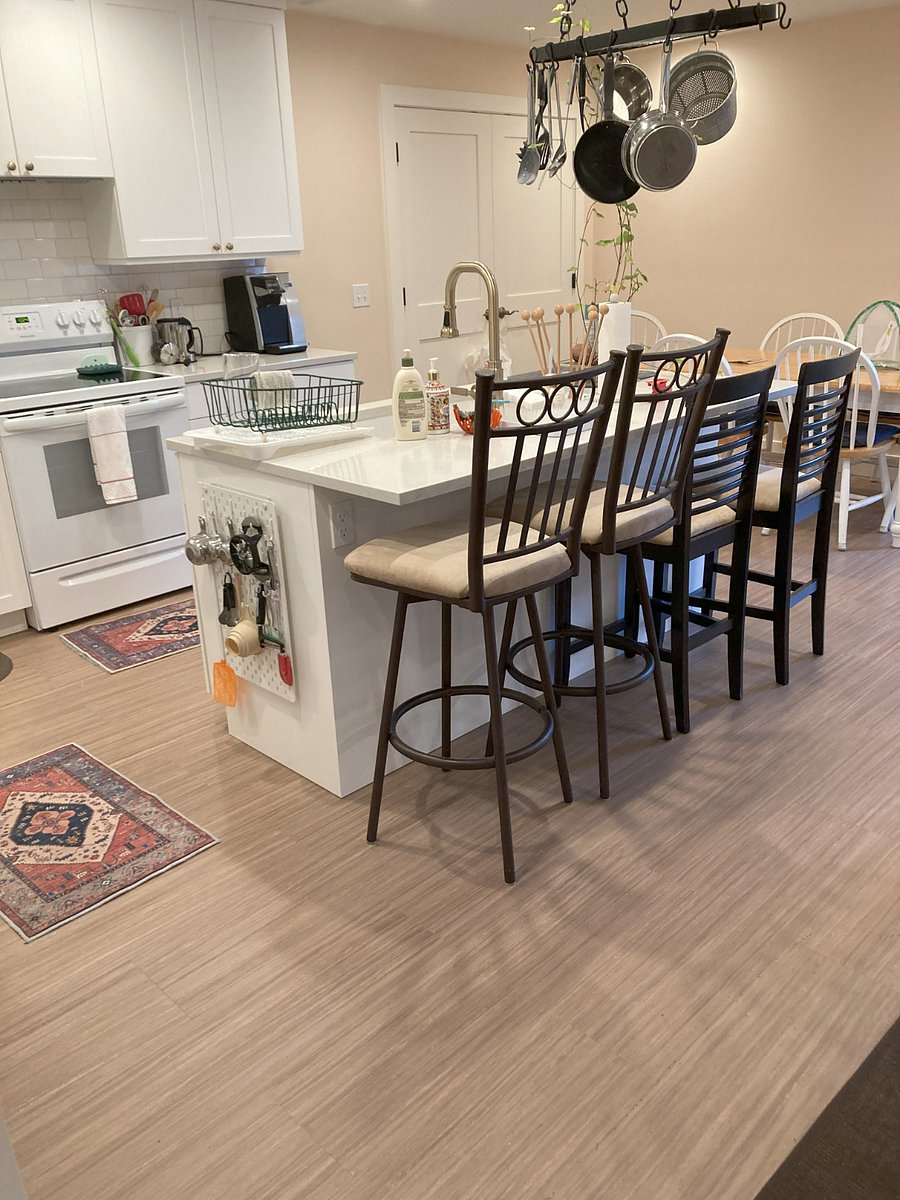 Kitchen--table and six chairs on right.