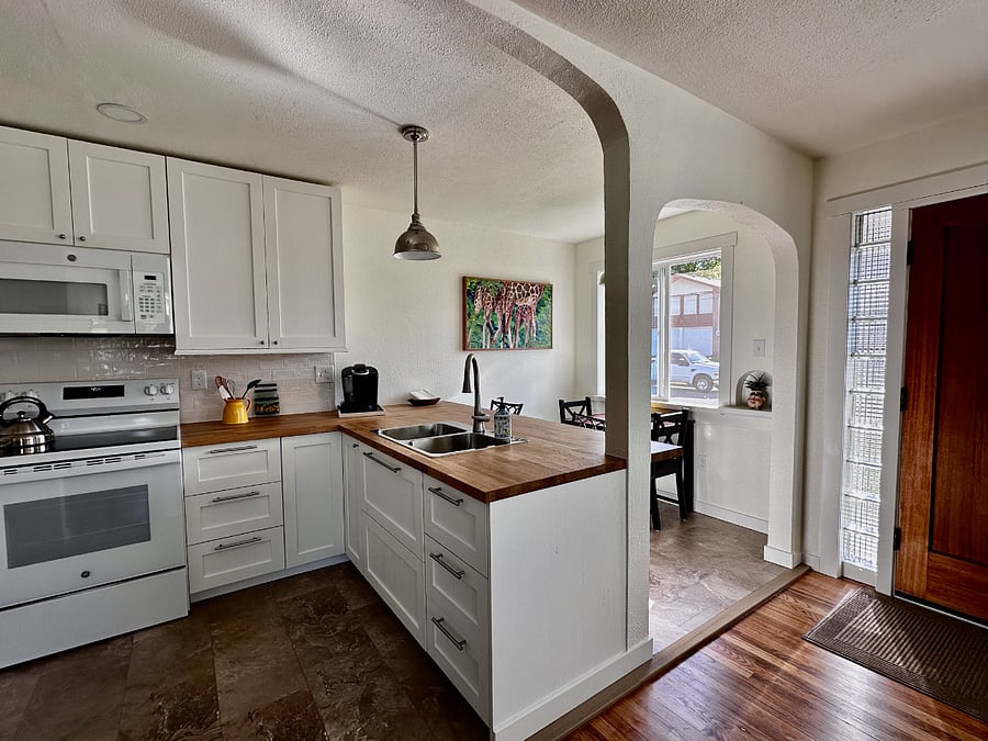 Dining options include bar-style seating area and a cheerful dining nook.