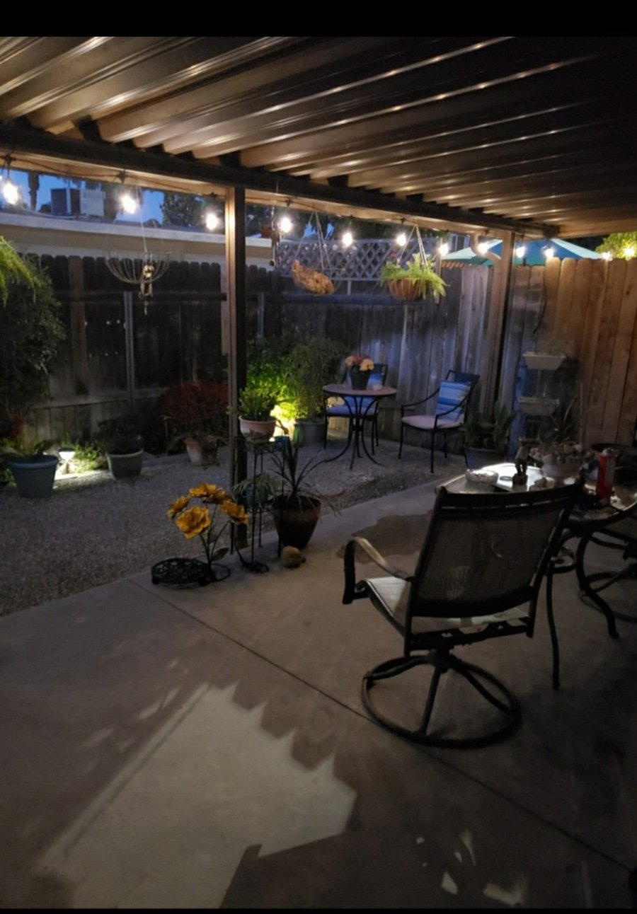 Outdoor covered patio wonderful sanctuary to go and relax. This is the place to if you smoke to go.