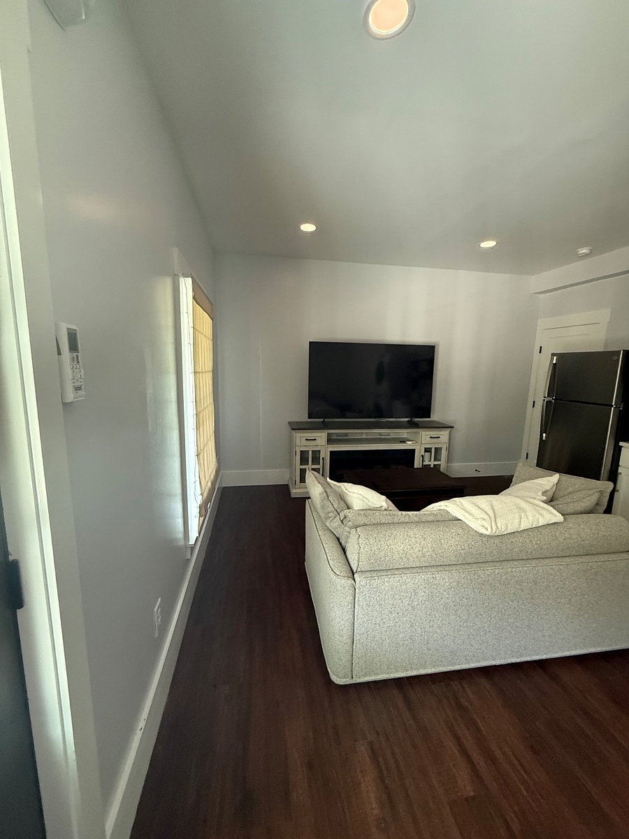 Queen sleeper koala couch, 70 TV, electric fireplace