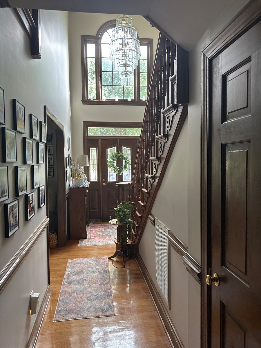Looking down the hall from the kitchen to the front door.
