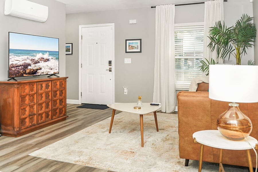 Catch your favorite shows or enjoy quiet moments in this bright and inviting living space, complete with a smart TV and stylish dcor.