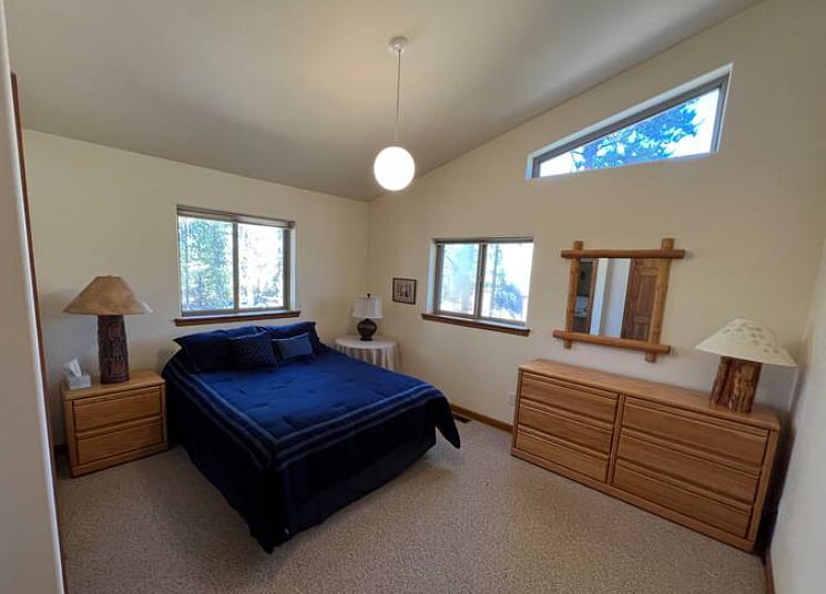 Primary bedroom with queen bed & ensuite with full bath