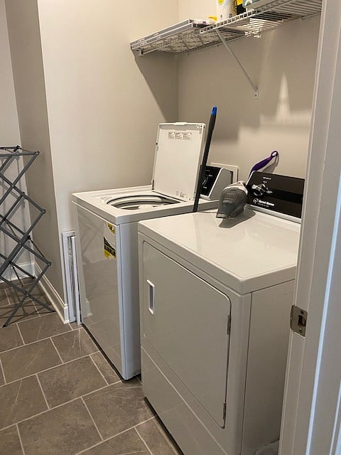 Speed Queen washer and dryer on main floor off the kitchen.