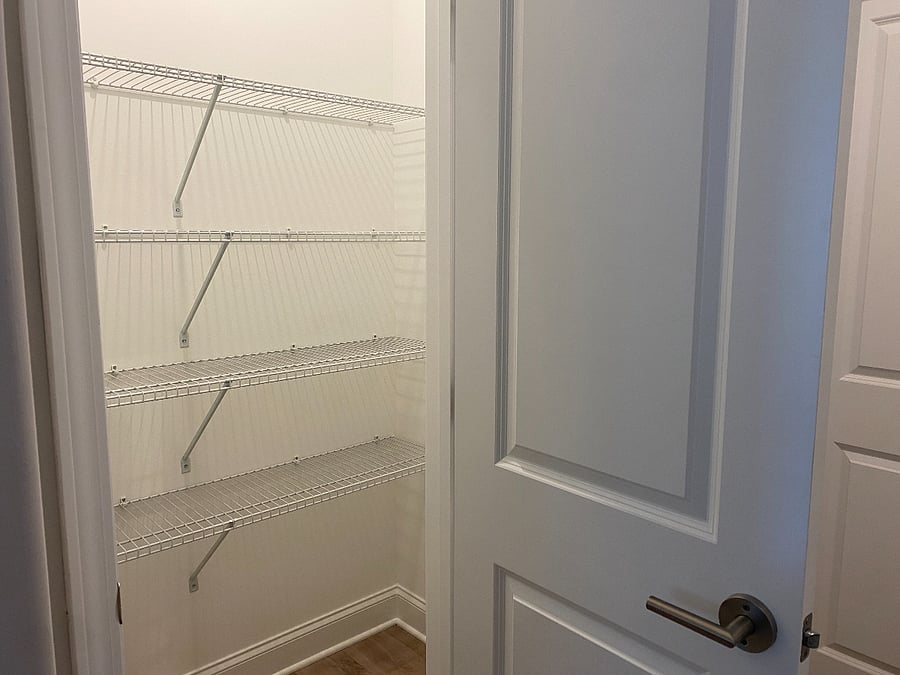 Large pantry next to kitchen.