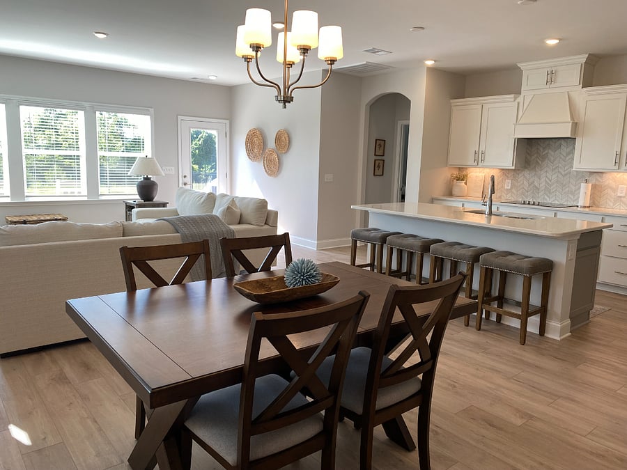 Dining room table has extended leaf to seat 6 people