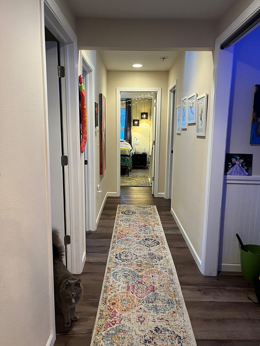 Hallway. Bed room at end of hall