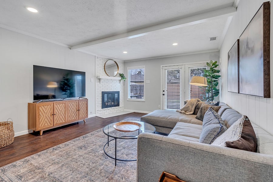 Back Living Room with 65" QLED Smart TV