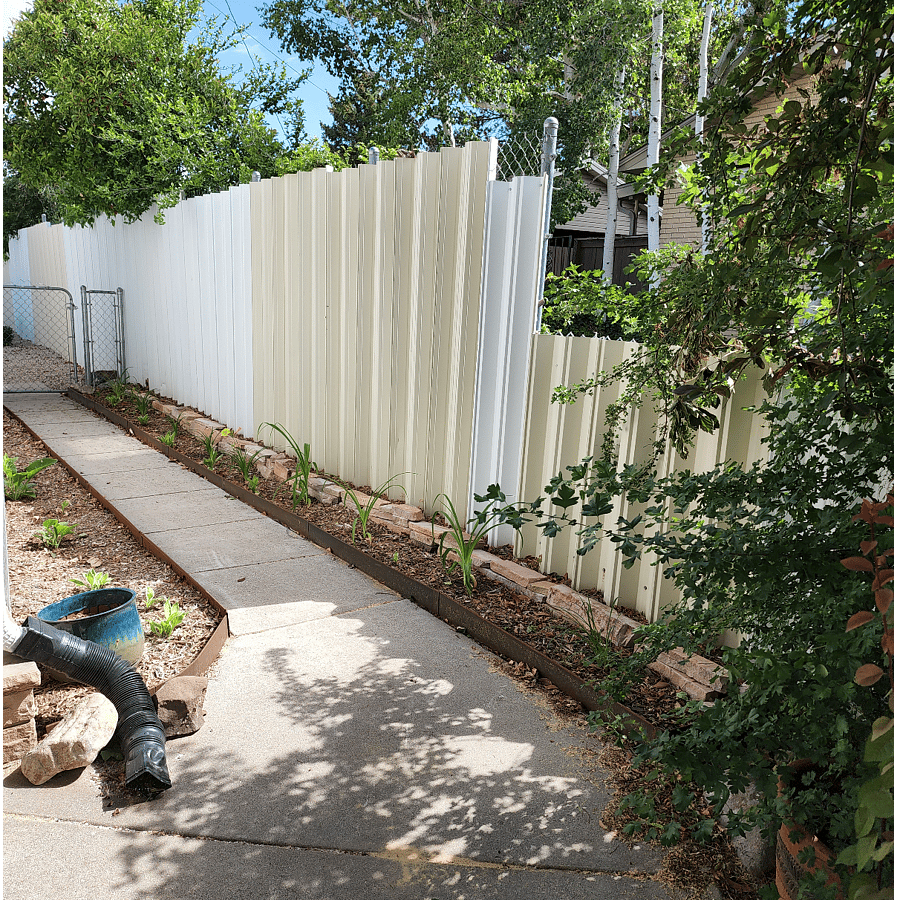 Private entrance around the garage to the unit