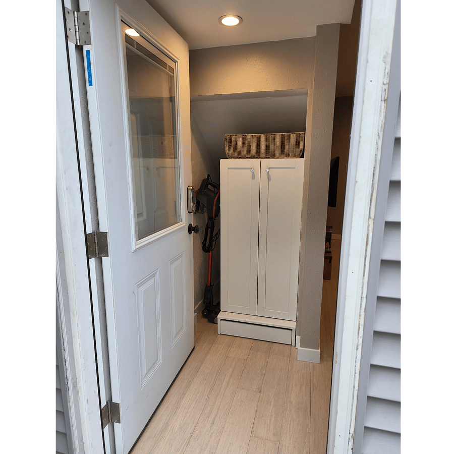 Coat closet at the entrance to the unit