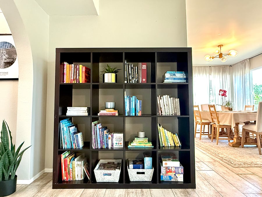 Book shelf with Children's books, puzzles, and games