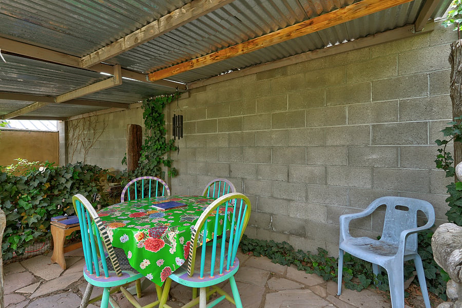 Outdoor seating by lovely garden!