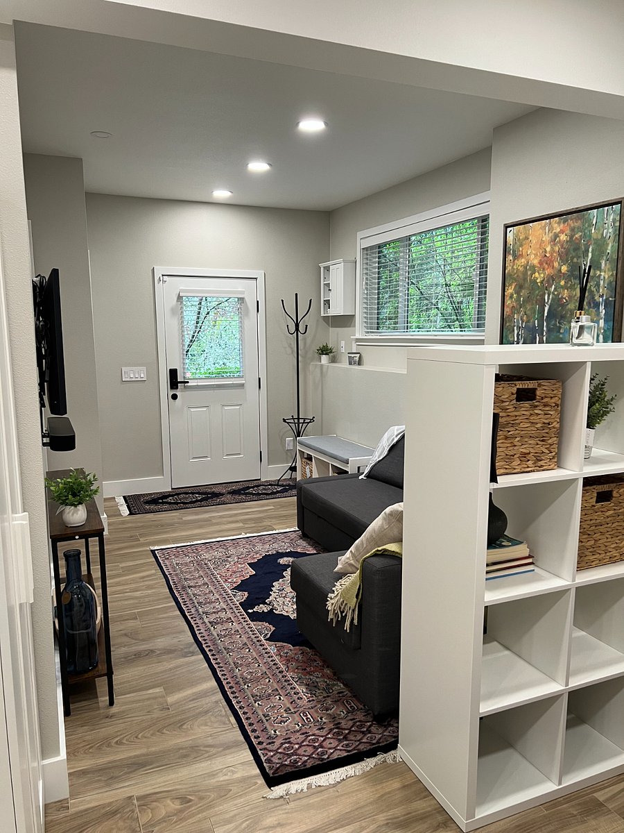 View from foot of bed to front door.